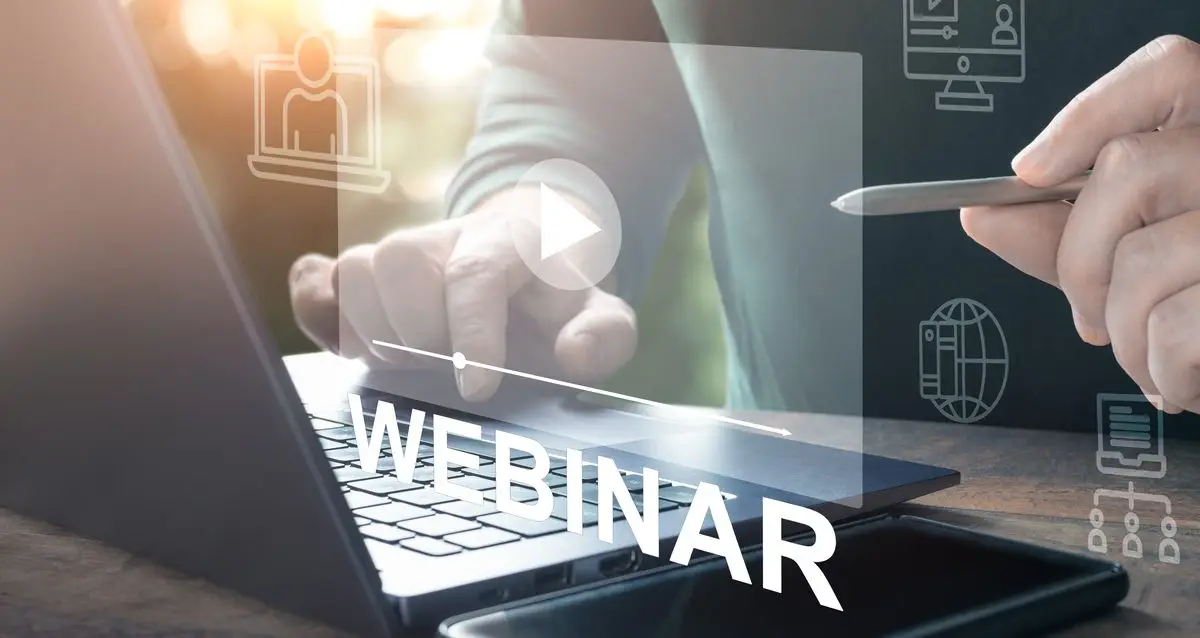 Webinar online. Hand use E-business Browsing Connection on laptop. online seminar. hand typing on laptop with online conference screen. White webinar text over man working on computer