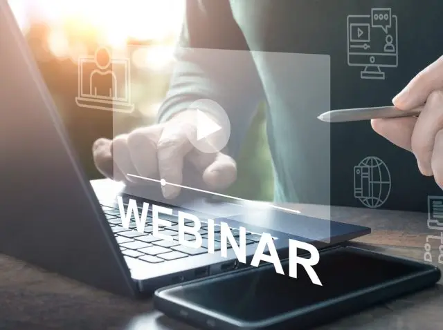 Webinar online. Hand use E-business Browsing Connection on laptop. online seminar. hand typing on laptop with online conference screen. White webinar text over man working on computer