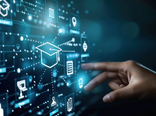 hand touching graduation cap on virtual screen